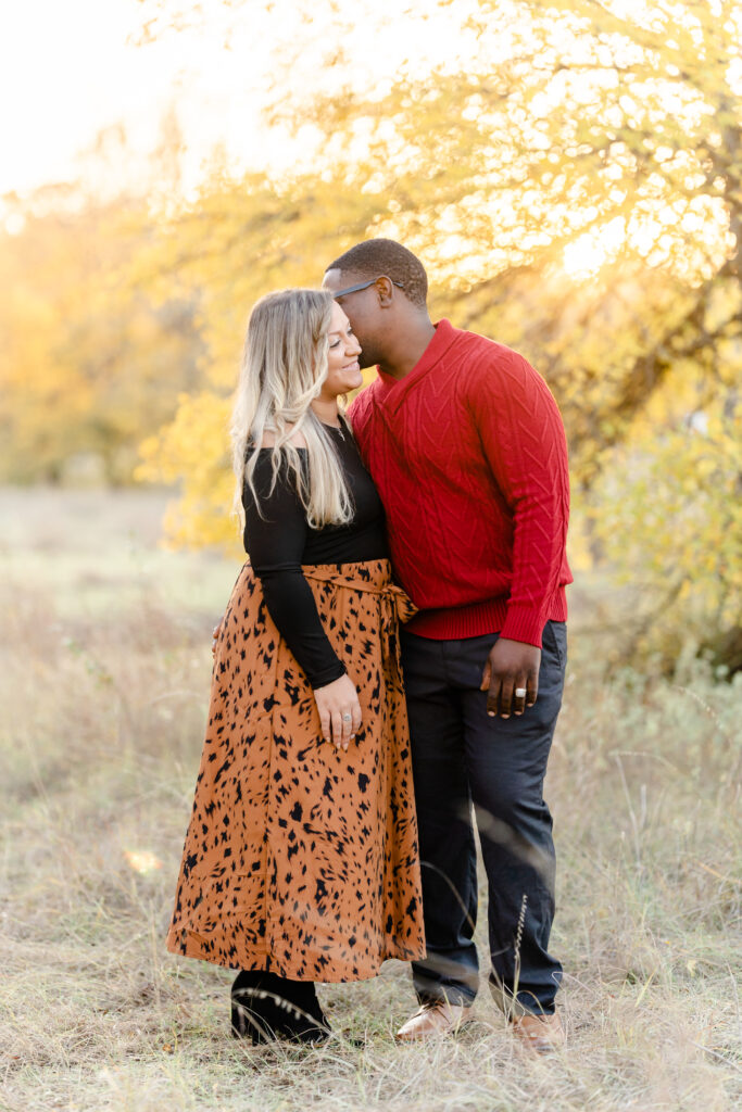 A couple during a family photo session in Plano, TX.