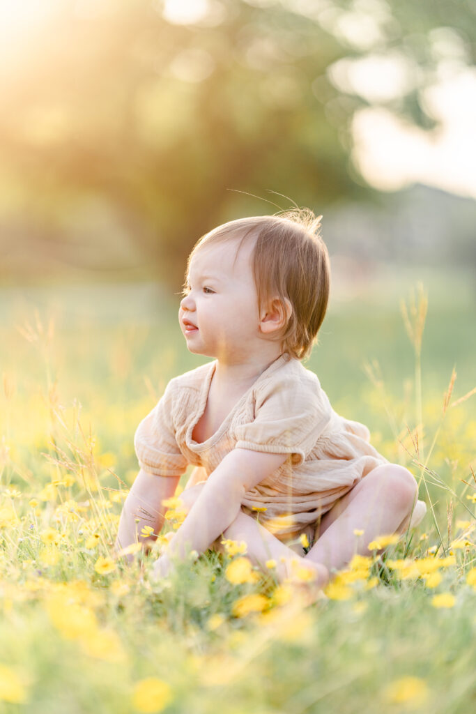 Baby enjoying flowers by Dallas Family Photographer Tonaya Noel Photography