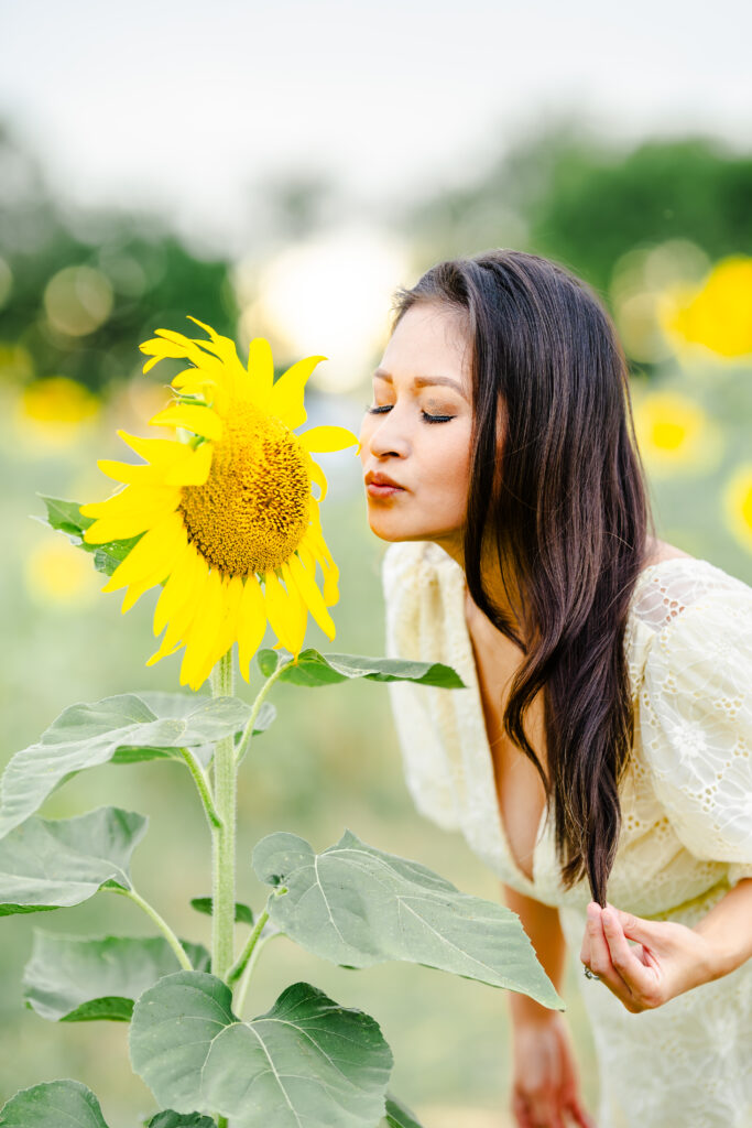 Joyful summer family portraits in sunflower field at The Little Sunflower Farm near Dallas