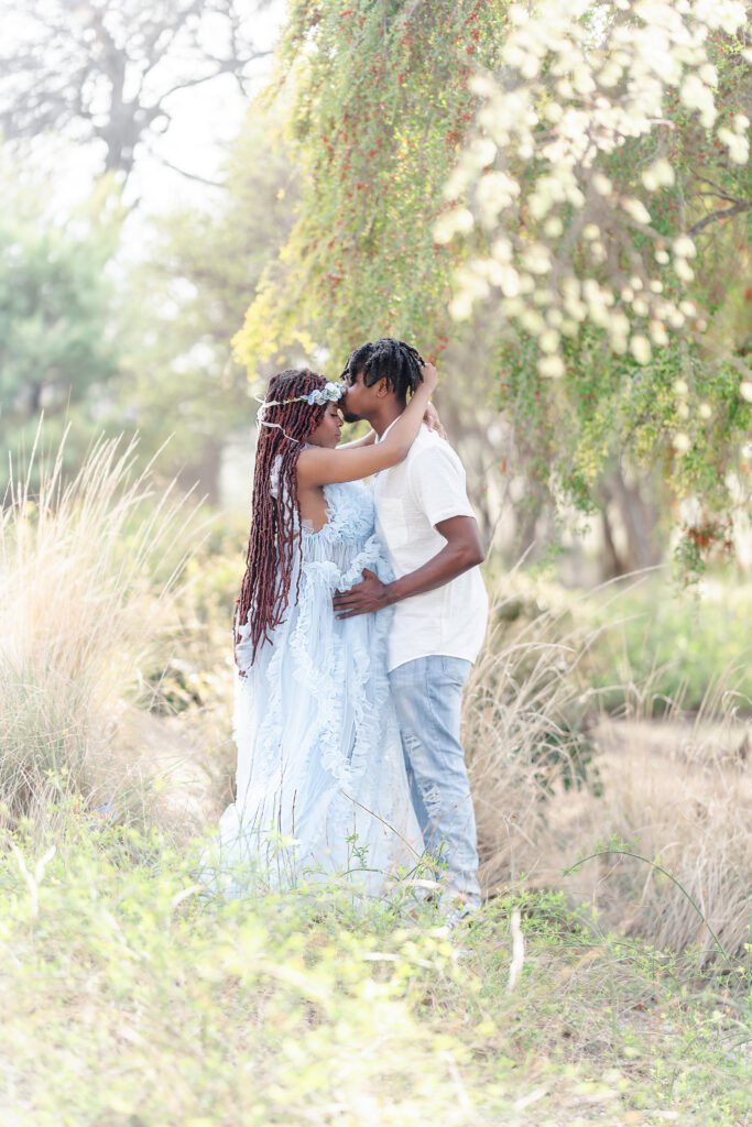 A maternity session at the Dallas Arboretum in spring.