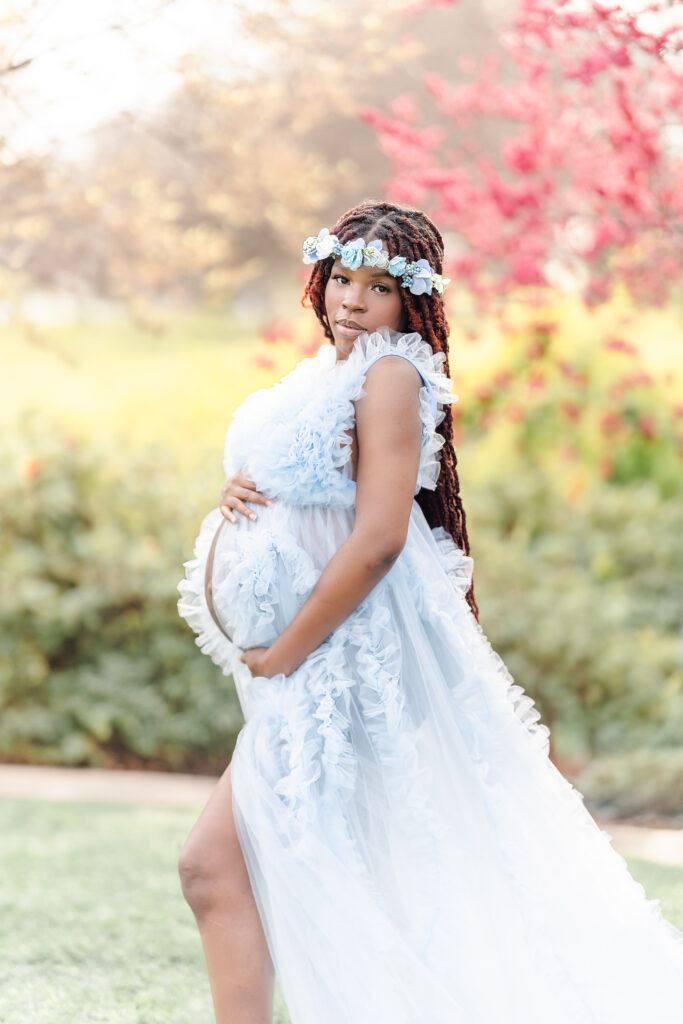 A beautiful maternity session at the Dallas Arboretum during cherry blossom season.